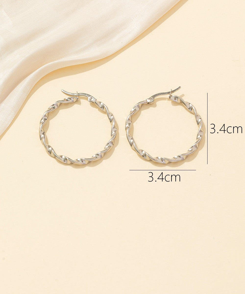 Boucles d'oreilles Créoles  Acier 24BOA037a