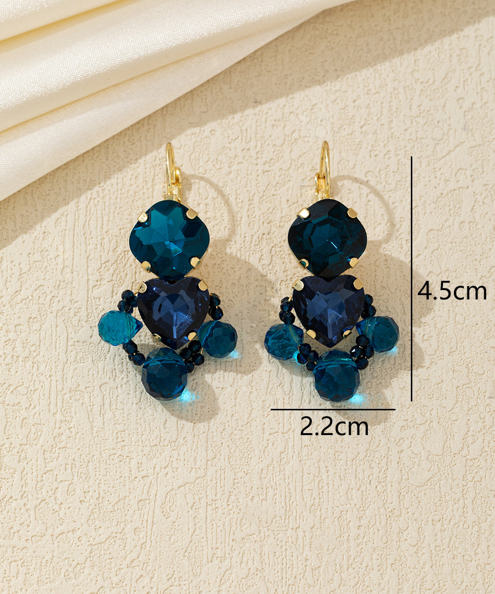 Boucles d’oreilles cœur facetté pendantes – 26AHBOL024