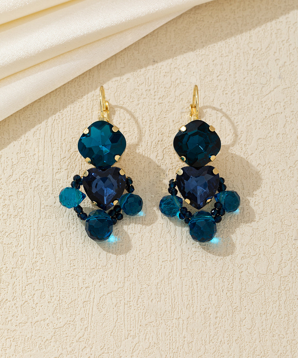 Boucles d’oreilles cœur facetté pendantes – 26AHBOL024