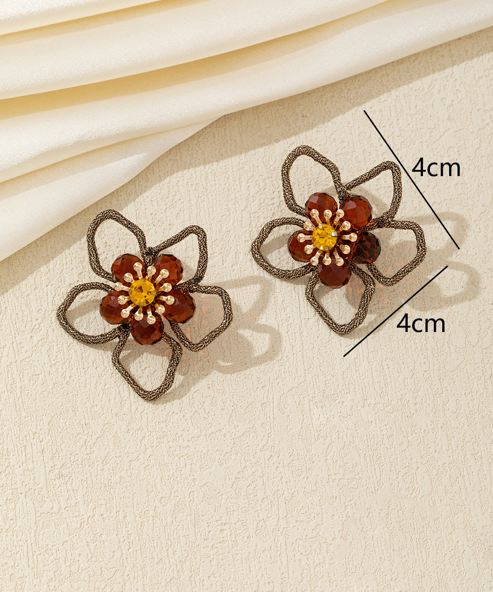 Boucles d’oreilles fleur ajourée cristal – 26AHBOL034