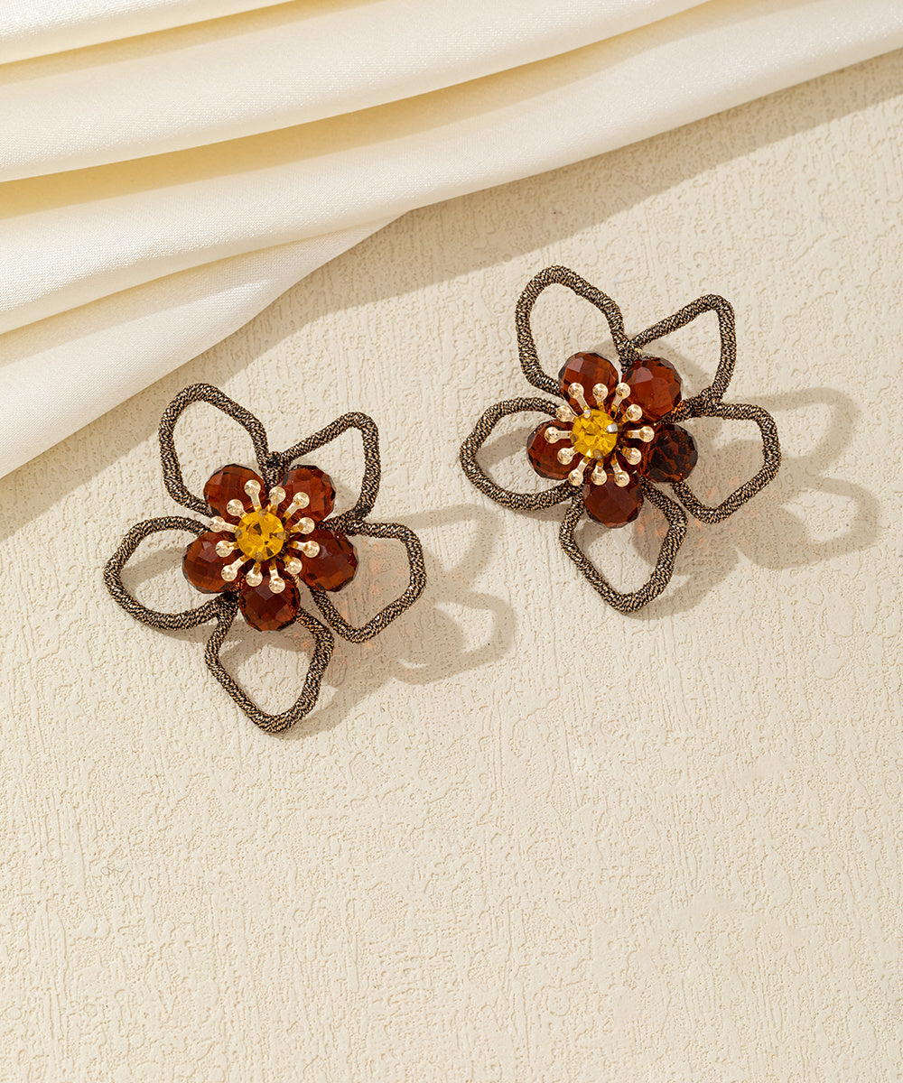 Boucles d’oreilles fleur ajourée cristal – 26AHBOL034