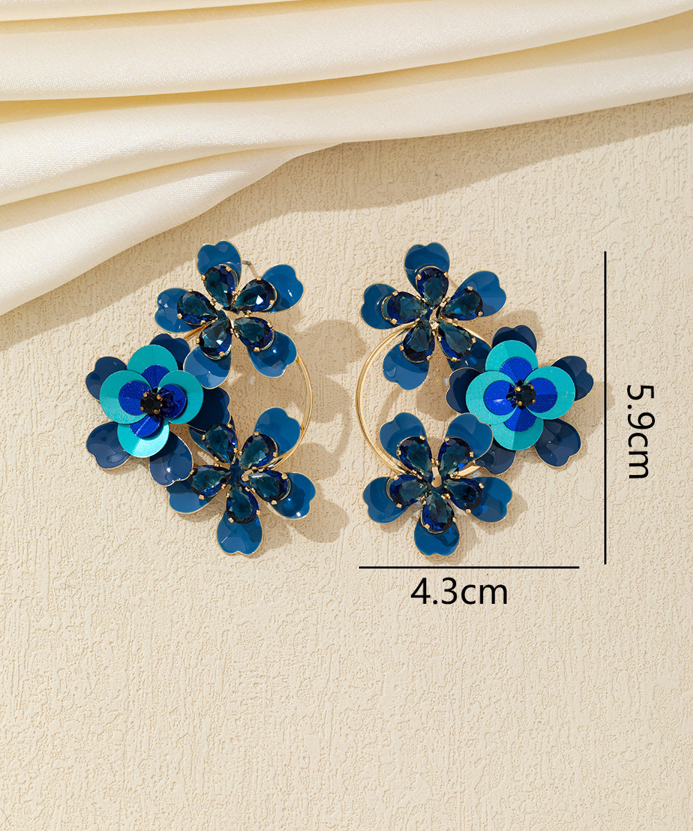 Boucles d’oreilles pendantes fleurs sequins & verre Clou – 26AHBOL069