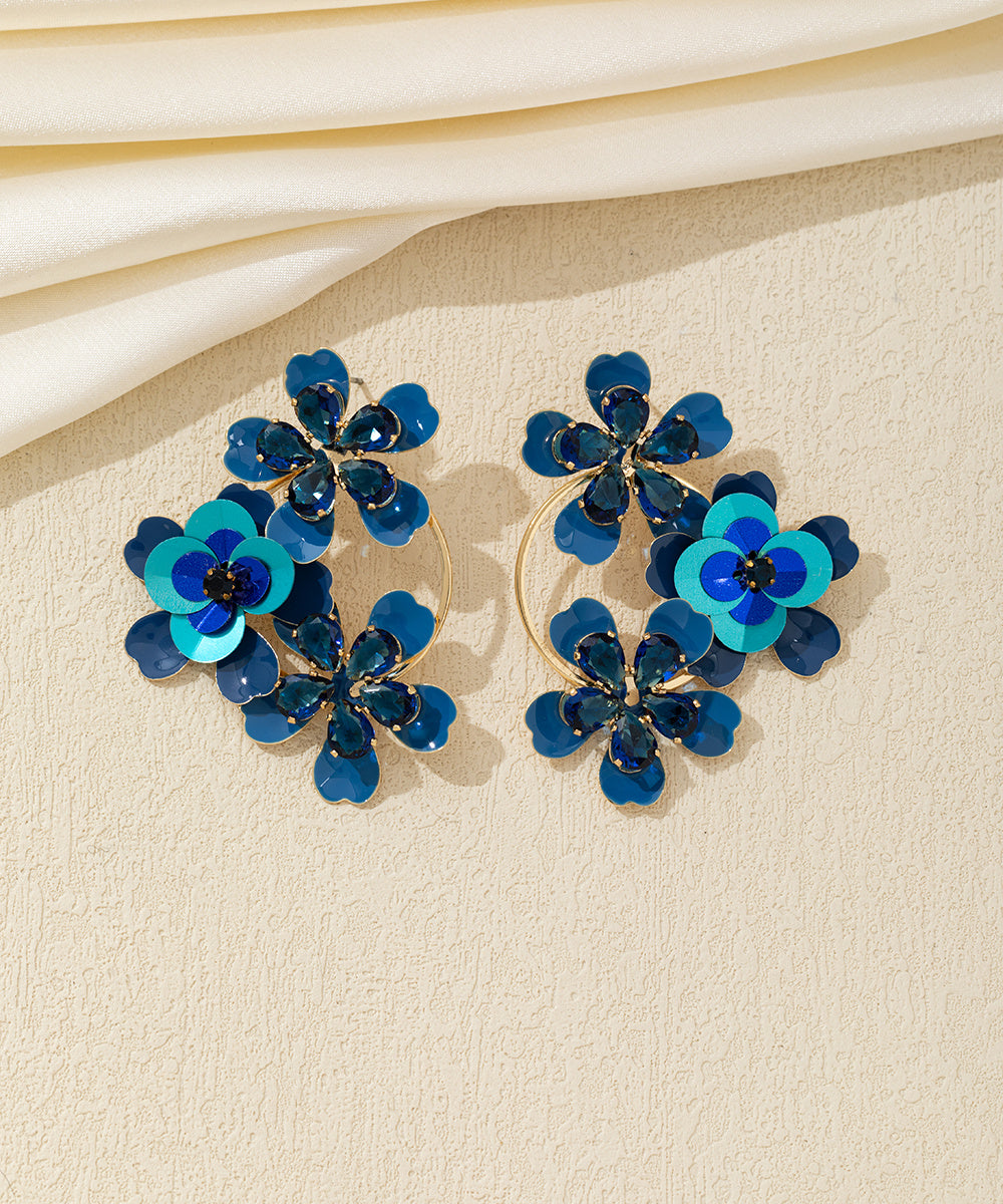 Boucles d’oreilles pendantes fleurs sequins & verre Clou – 26AHBOL069
