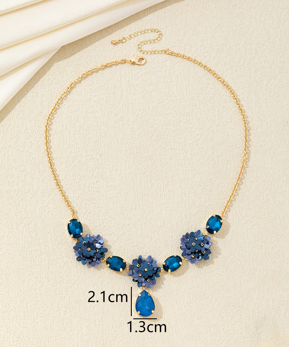 Collier fleurs sequins & verre goutte – 26AHCC001