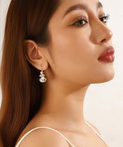 Boucles d’oreilles dormeuse strass trio ovale – 26PEBOL011