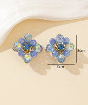 Boucles d’oreilles clips fleur strass facettés – 26PEBOL036