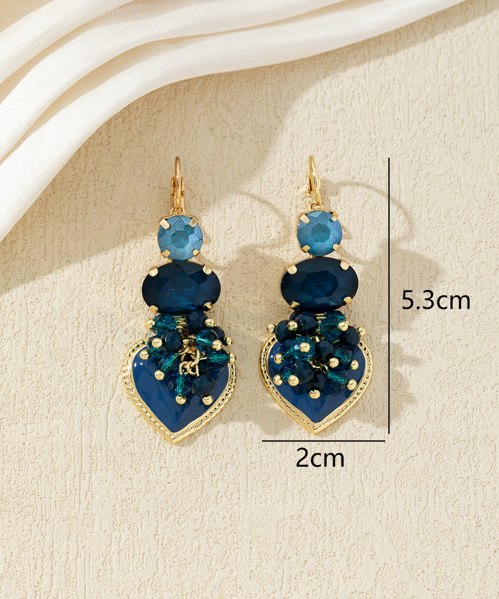 Boucles d’oreilles pendantes avec cœur et perles 27AHBOL001
