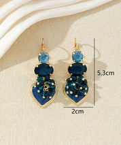 Boucles d’oreilles pendantes avec cœur et perles 27AHBOL001