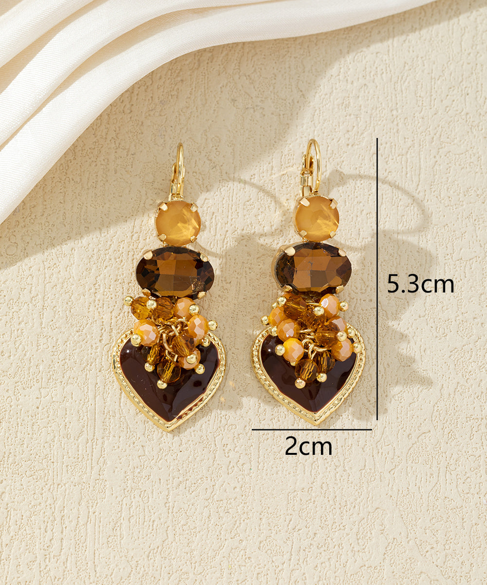 Boucles d’oreilles pendantes avec cœur et perles 27AHBOL001