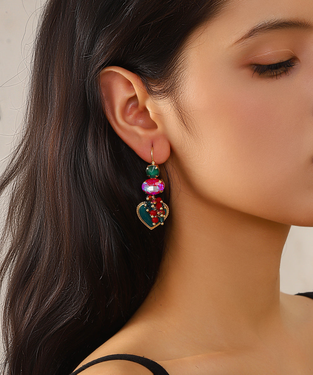 Boucles d’oreilles pendantes avec cœur et perles 27AHBOL001