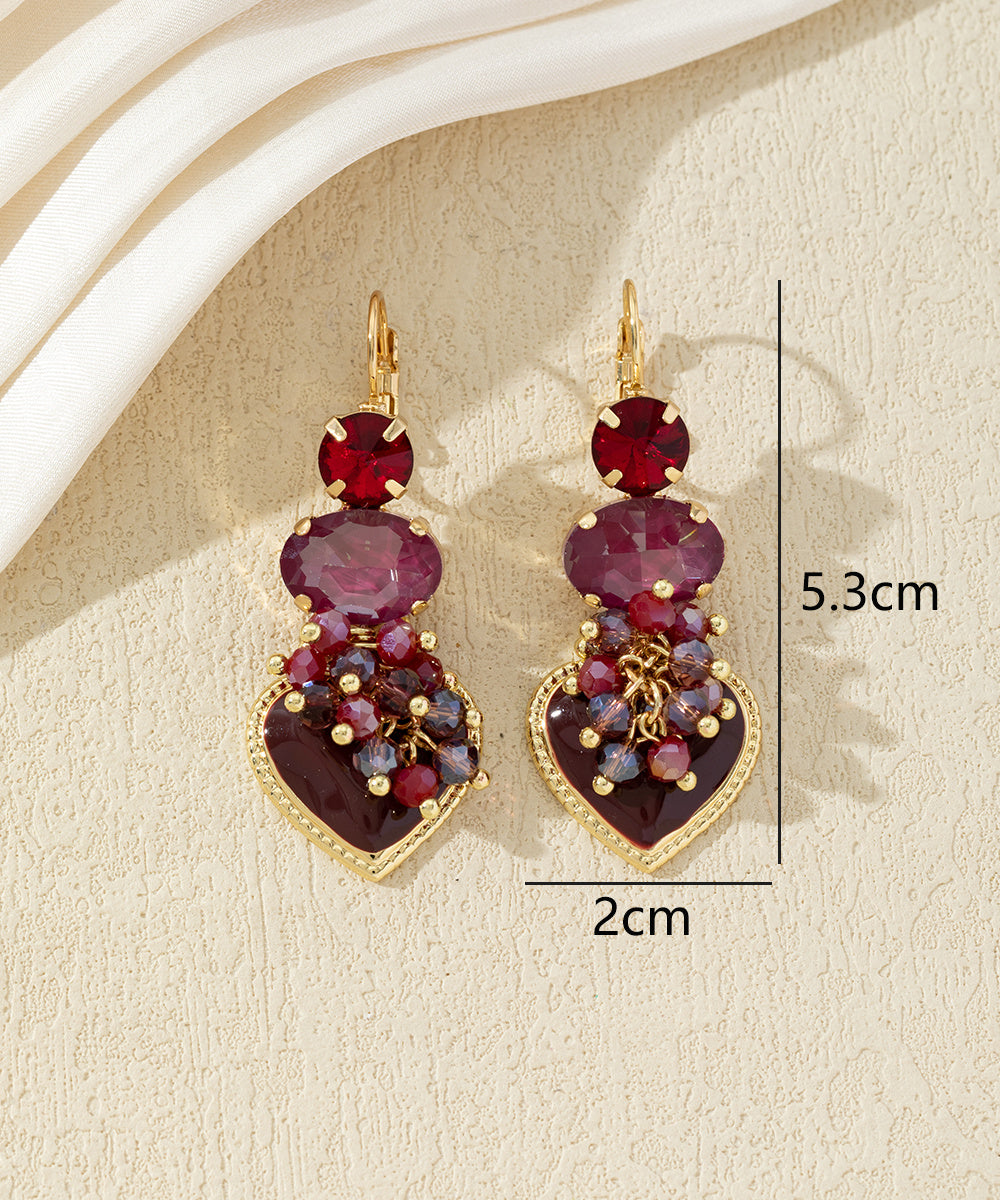 Boucles d’oreilles pendantes avec cœur et perles 27AHBOL001