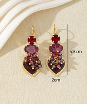Boucles d’oreilles pendantes avec cœur et perles 27AHBOL001