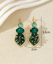 Boucles d’oreilles pendantes avec cœur et perles 27AHBOL001
