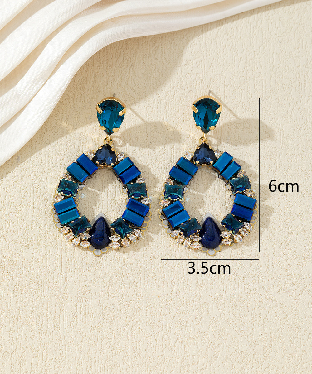 Boucles d’oreilles pendantes ornées de cristaux 27AHBOL012