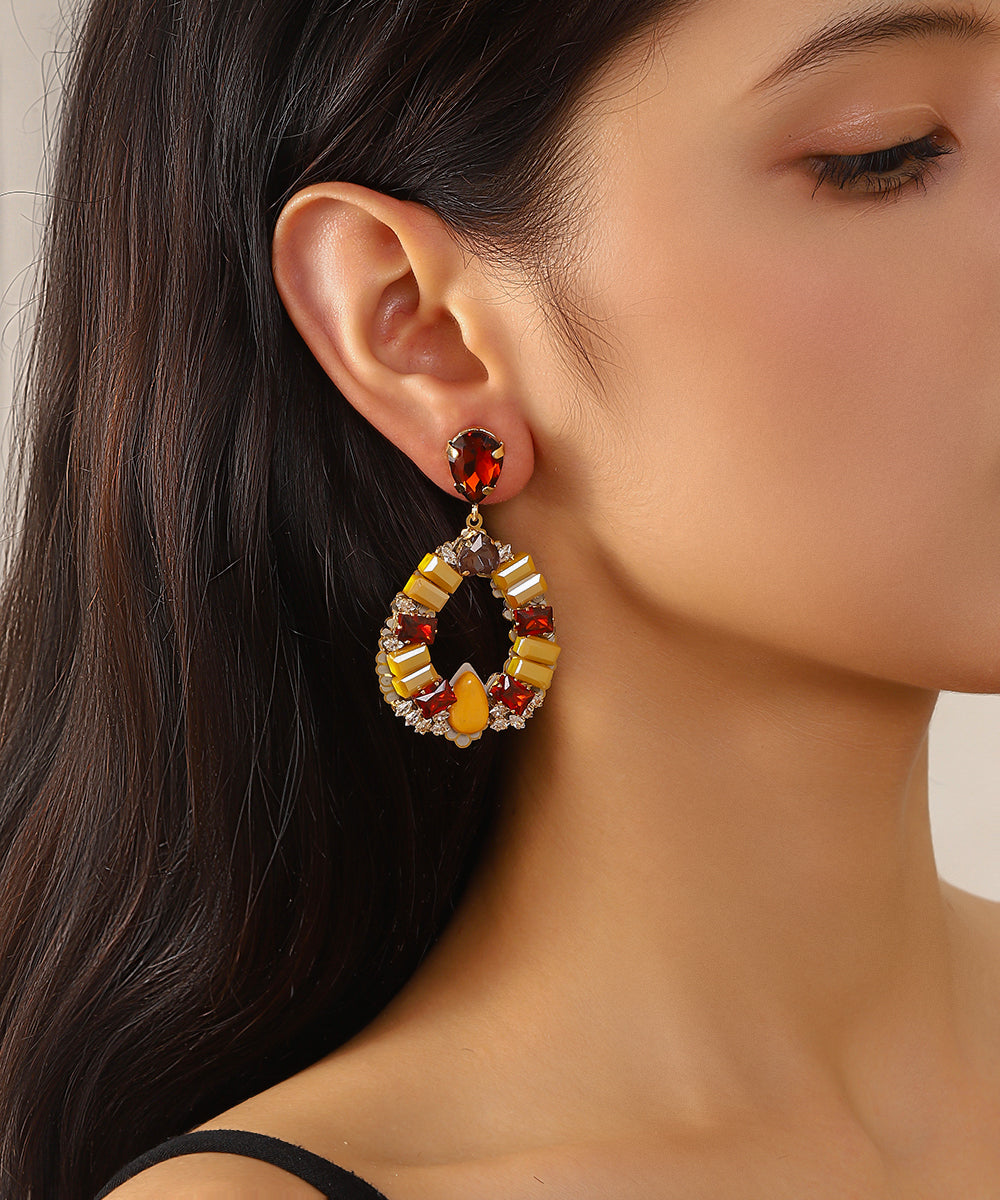 Boucles d’oreilles pendantes ornées de cristaux 27AHBOL012