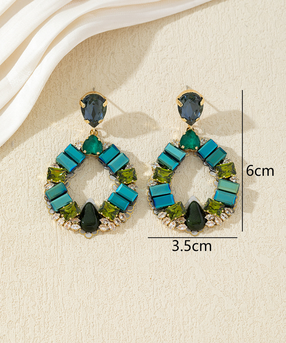 Boucles d’oreilles pendantes ornées de cristaux 27AHBOL012