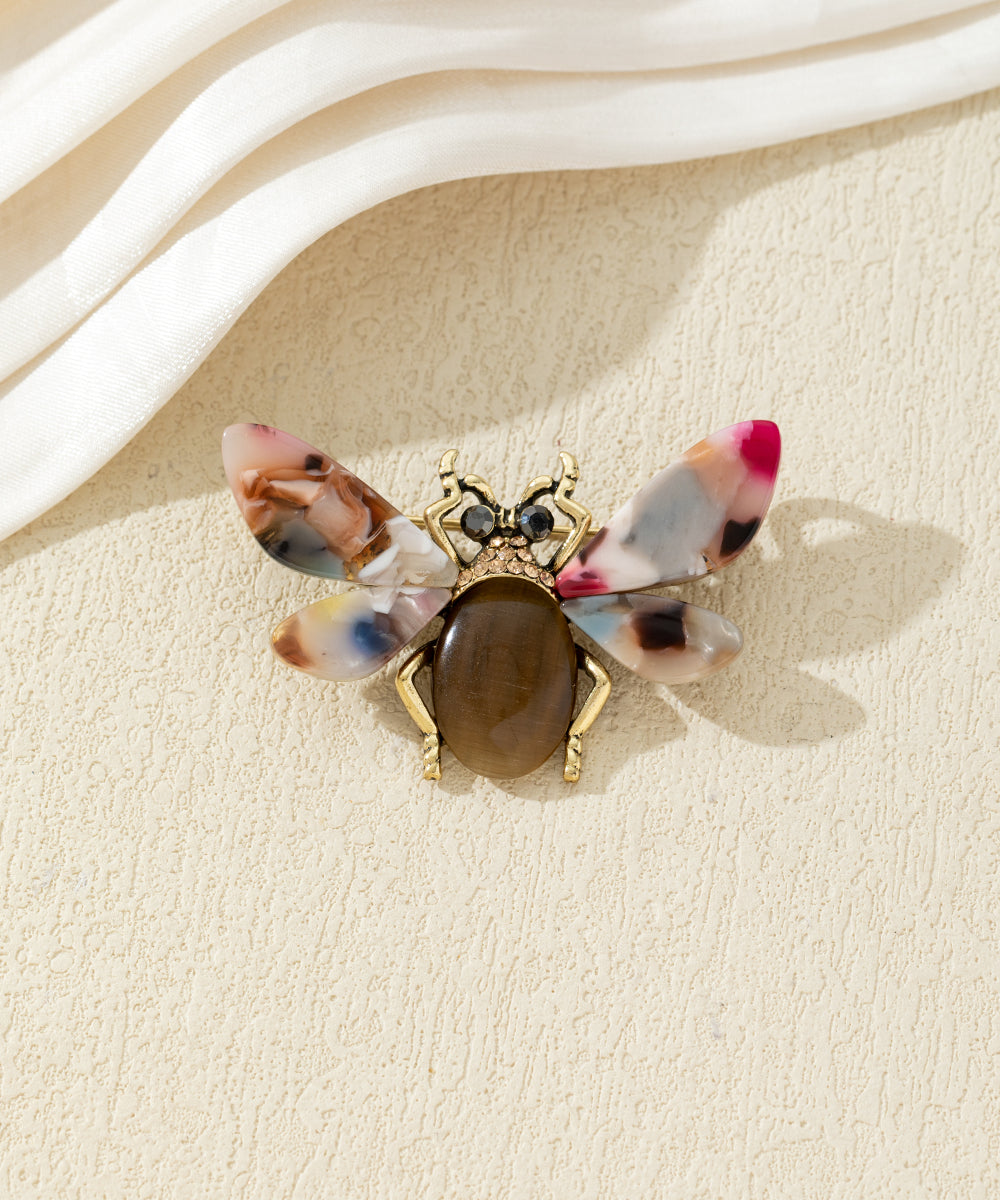 Broche abeille colorée avec ailes effet marbré