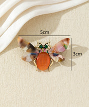 Broche abeille colorée avec ailes effet marbré