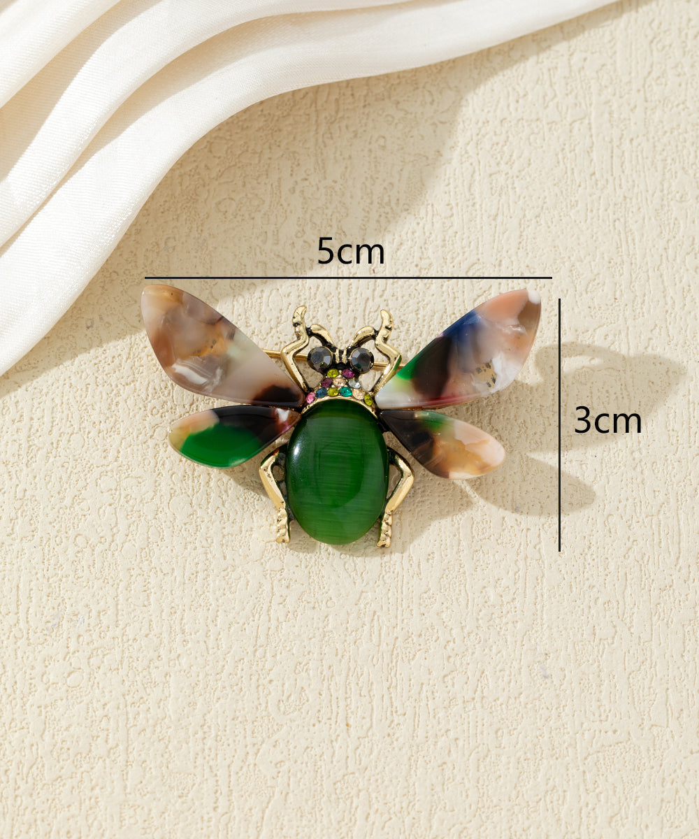 Broche abeille colorée avec ailes effet marbré