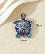 Broche tortue fantaisie avec strass