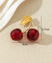 Broche cerises colorées