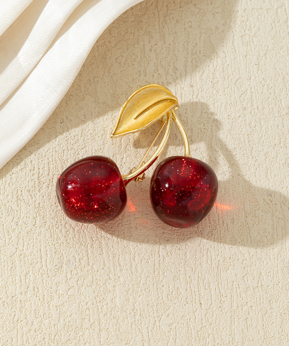 Broche cerises colorées
