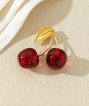 Broche cerises colorées