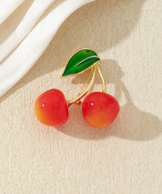 Broche cerises colorées