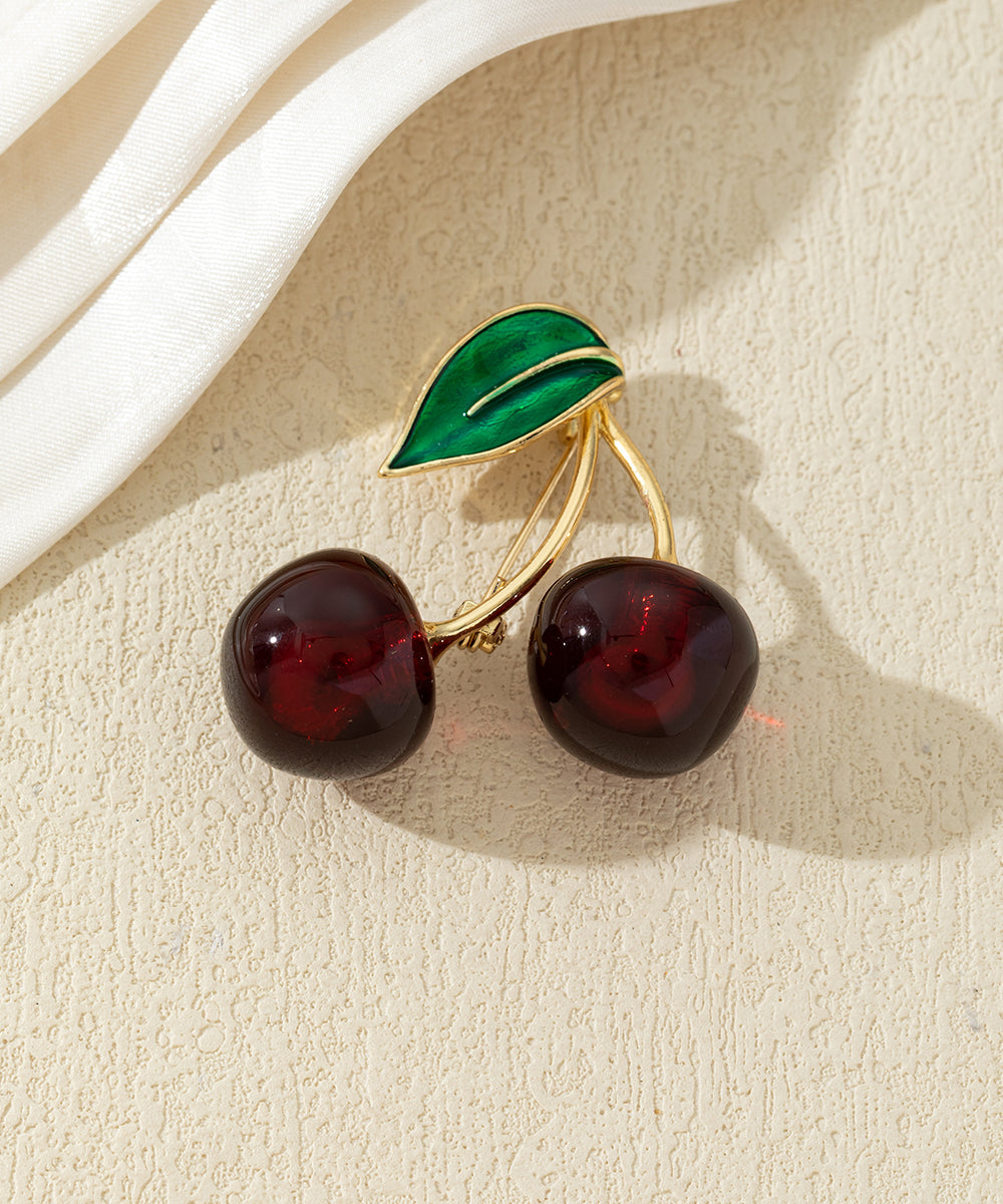 Broche cerises colorées