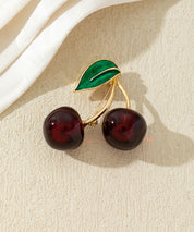 Broche cerises colorées