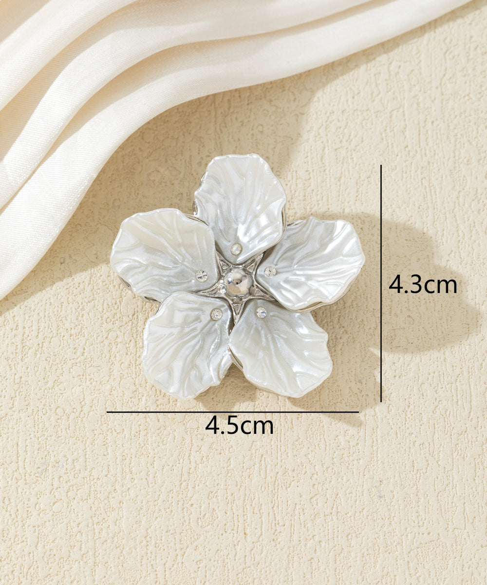 Broche fleur nacrée avec strass