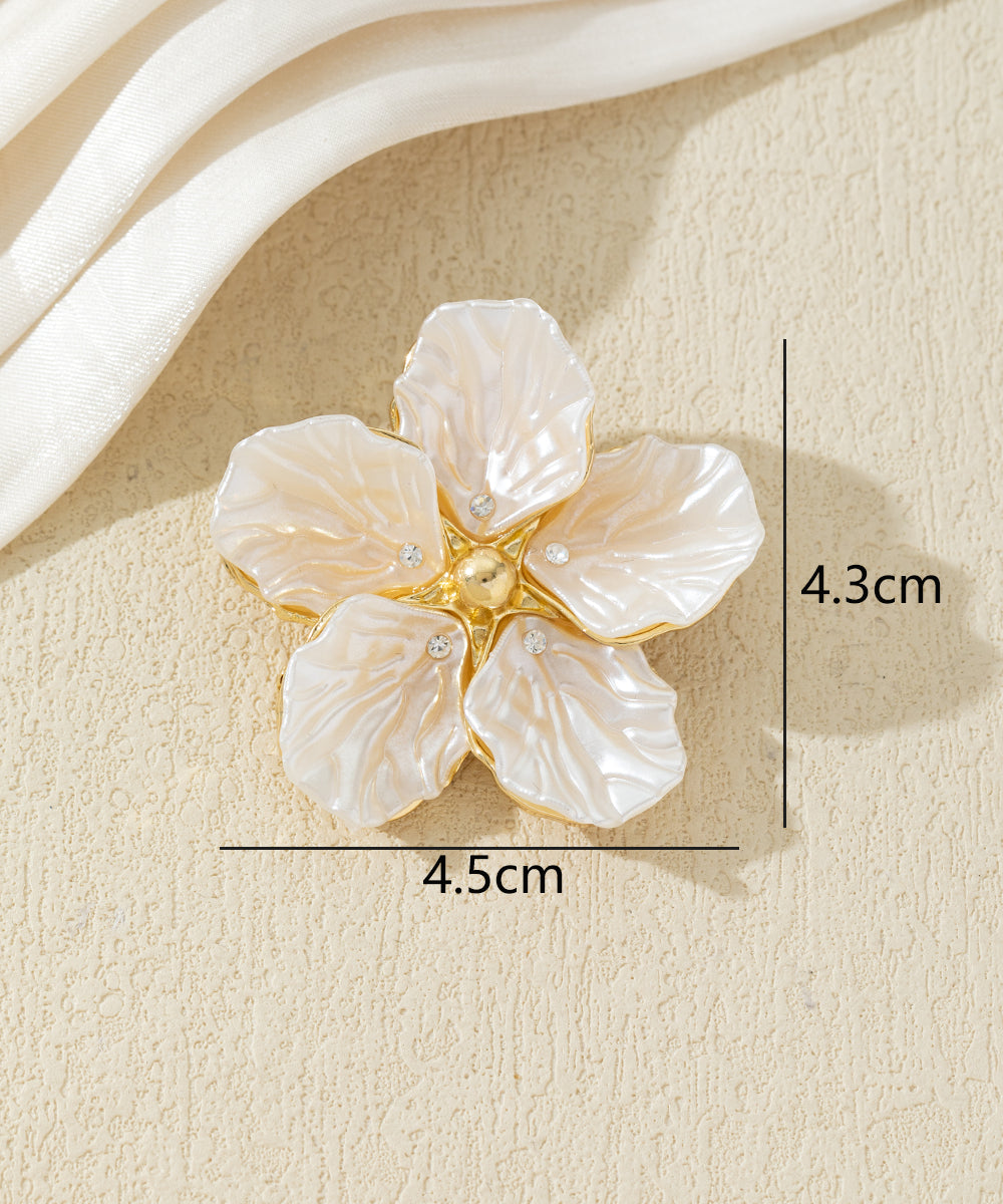Broche fleur nacrée avec strass