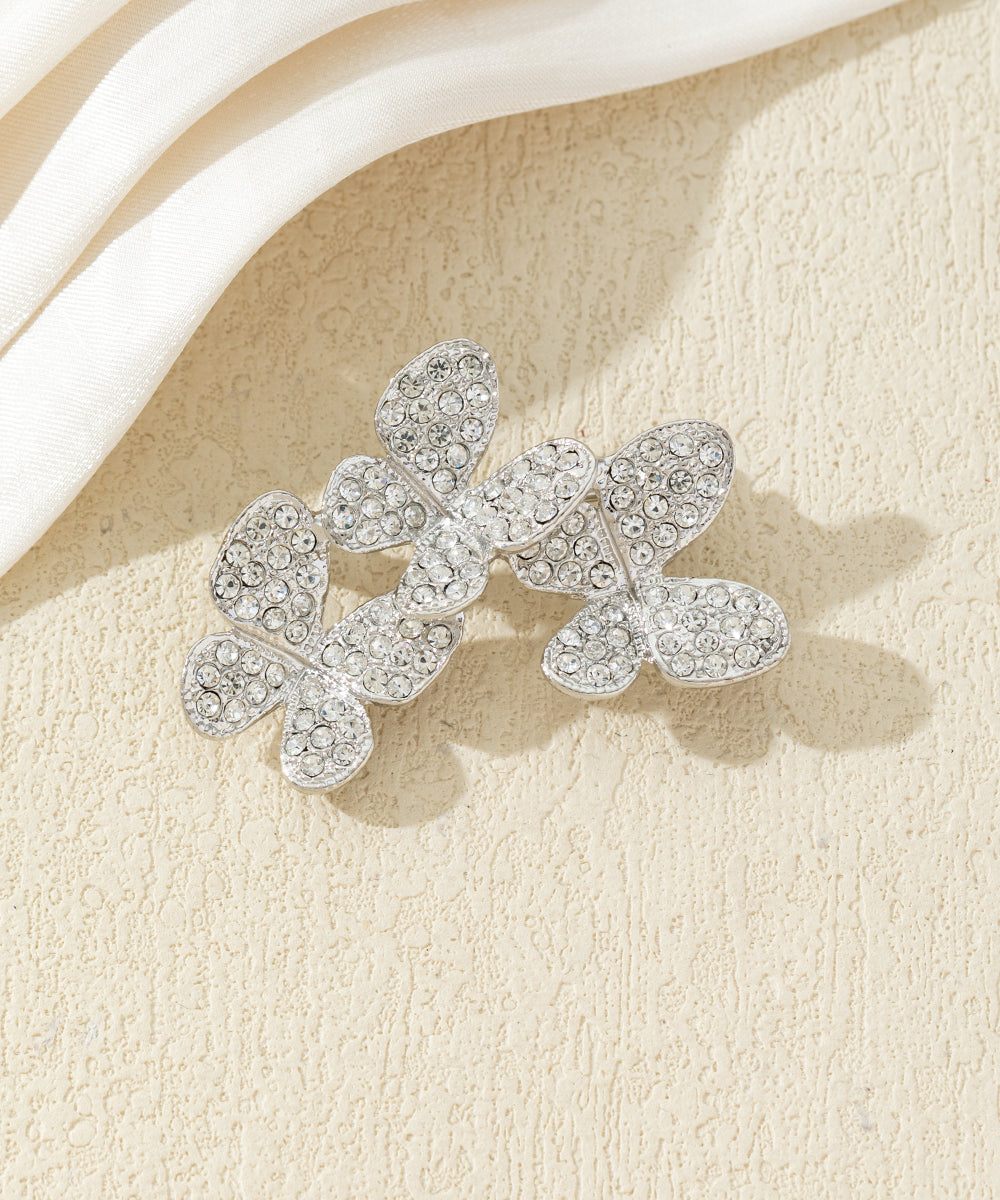 Broche branche fleurie ornée de strass
