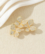 Broche branche fleurie ornée de strass