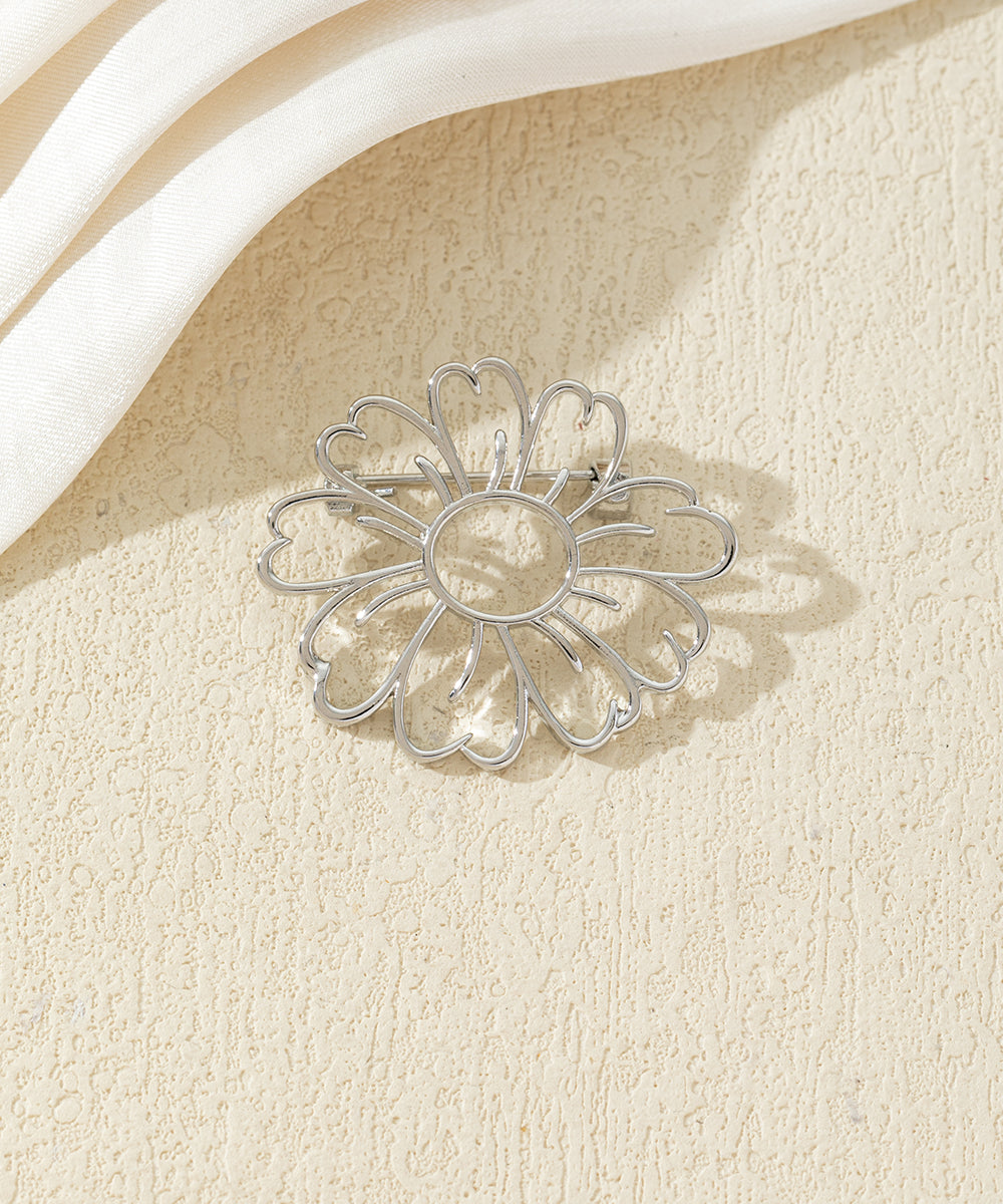 Broche fleur ajourée