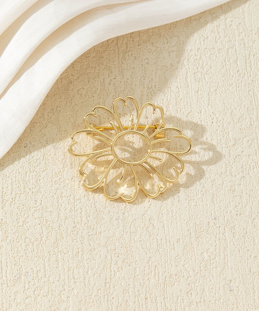Broche fleur ajourée