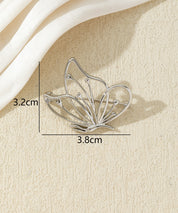 Broche papillon ajourée dorée ou argentée