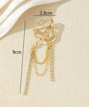Broche visage féminin avec chaînes strass