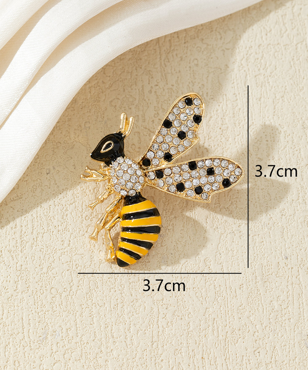 Broche abeille strass et émail