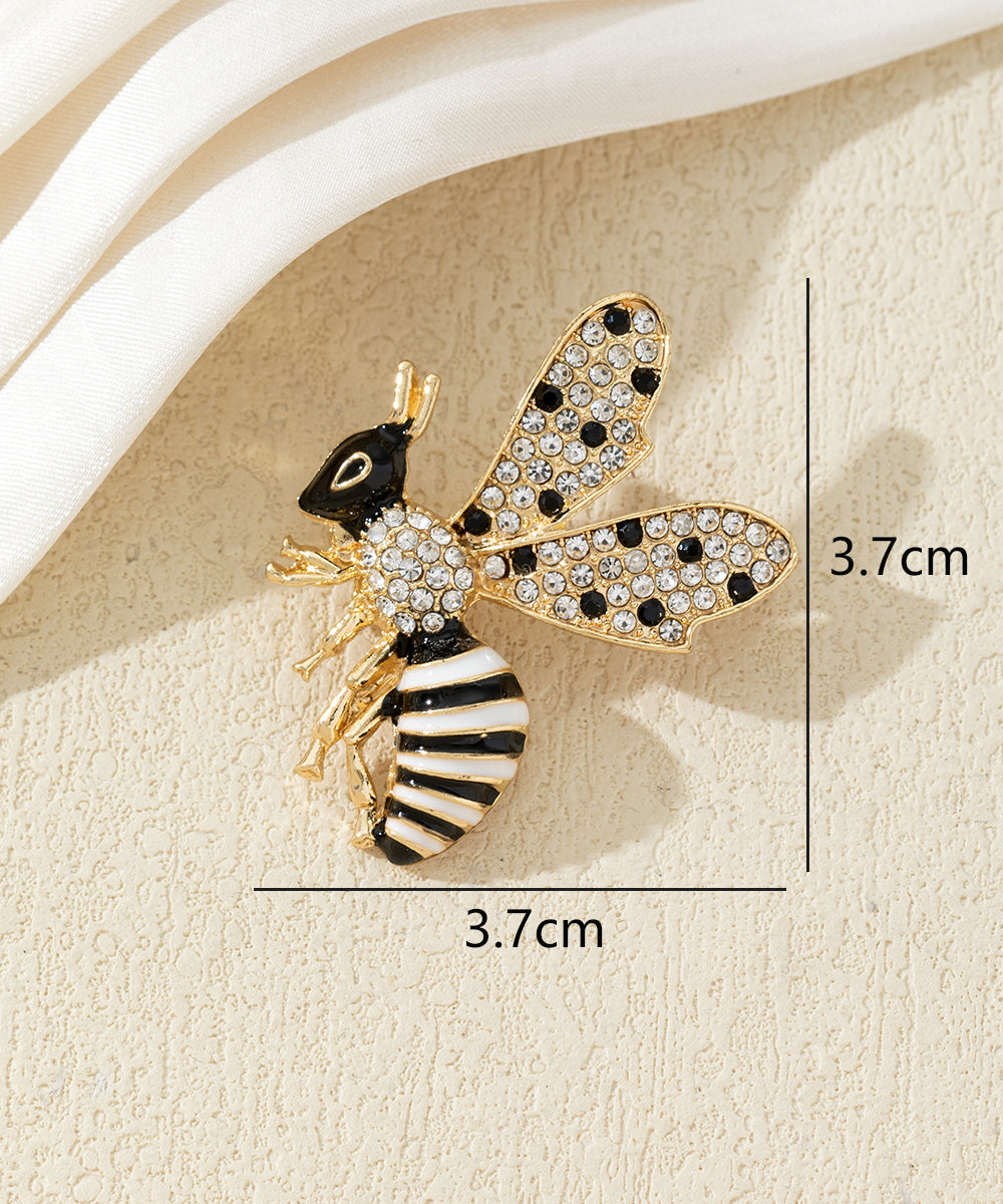 Broche abeille strass et émail