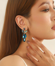 Boucles d’oreilles pendantes feuillage et goutte perlée Clou  – 26AHBOL070